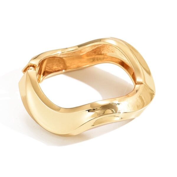 Elegant Sculpted Gold Bracelet  Modern Statement Jewelry For Every Occasion - Image 5