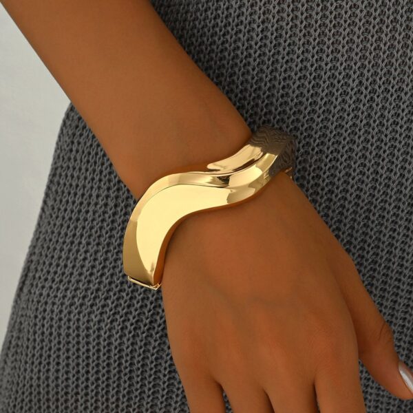 Elegant Sculpted Gold Bracelet  Modern Statement Jewelry For Every Occasion - Image 2