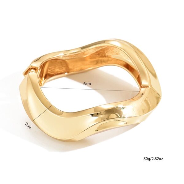 Elegant Sculpted Gold Bracelet  Modern Statement Jewelry For Every Occasion - Image 3